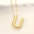 Polished gold U-shaped initial necklace with ribbed texture on a delicate O-link chain - Gold Letter U
