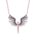 Close-up of rose gold angel wing pendant with blue and black gradient crystals - 925 Silver / Rose Gold