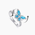 Rotierender Schmetterling-Ring aus Silber mit blauem Zirkonia zur Stressbewältigung - Offen (Verstellbar) / Weißgold