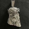 Macro shot of silver hip hop Jesus pendant with detailed rhinestones and crown of thorns - Silver Head Single Pendant