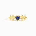 Elegant gold ring featuring a heart-shaped blue gemstone and intricate ribbon detailing - US Size 6 / Gold