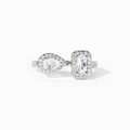 S925 silver Toi et Moi ring with pear and emerald cut stones on a white background - Adjustable US Size 7 / White Gold