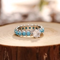 S925 sterling zilveren ring met grote zirkoon en turquoise pavé op natuurlijk hout - US Maat 6 / Witgoud