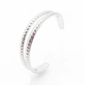 Close-up of double-layer twisted rope texture on a minimalist silver open cuff ring - Adjustable Open / White Gold