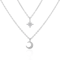 Detalle de collar doble de plata S925 con dijes de estrella y luna en micropavé - Plata 925 / Oro Blanco