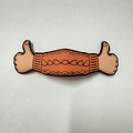 Detail of the orange magnetic PU leather bookmark with thumbs up design on white background - Thumbs Up Style / Orange