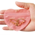 Pink heart-shaped PVC self-sealing jewelry bag with a gold heart charm bead bracelet - 8.5x10cm (Small) / Pink Wide Heart