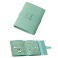 Detail view of mint green loose-leaf earring organizer with lychee grain and silver button - Green