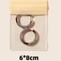 Golden round hoop earrings with sparkling zircon pave in a 6x8cm clear sealing bag - 20 Sealed Bags / Yellow