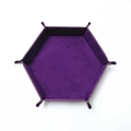 Flat lay of a purple hexagonal dice tray made of PU leather and velvet with metal snaps - Purple