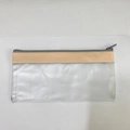 Top-down view of clear frosted PVC pencil case with beige trim and metal zipper - Beige