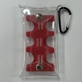 Macro view of transparent PVC coin pouch with red tiered organizers for Japanese Yen - Red