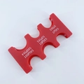 Detailed view of a red portable Japanese coin organizer with specific slots for Yen denominations - Red Coin Rack (CW-157)
