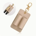 Detail of beige lychee pattern leather pen holder with golden swivel hook and white stitching - 8*4.5cm / Apricot