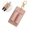 Macro detail of pink lychee leather dual pen holder keychain with gold metal lobster clasp - 8*4.5cm / Pink