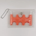 Close-up of clear PVC coin pouch and orange plastic organizer for Japanese yen sorting - Orange Bag Set