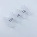 Macro view of clear plastic coin sorter showing specific slots for Japanese yen coins - Clear Coin Rack (CW-157)