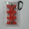 Detailed view of portable PVC coin organizer with Japanese yen slots and metal carabiner - Orange