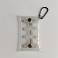 Detailed top view of a transparent PVC coin purse with internal Japanese yen sorter slots - Clear