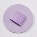 Detail view of round purple PU leather pen holder with elastic band for notebooks - Macaron Purple