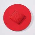 Macro shot of red round PU leather self-adhesive pen holder with elastic loop detail - Red
