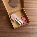 Macro view of mini precision scissors set in pink leather sheath with carabiner box - Hook Style / Pink