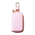 Detail view of pink glitter car key case with a rose gold metal hook and zipper closure - 14*5.5*2.5cm / Pink