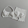 White halter neck yoga set featuring high-waisted lifting shorts and seamless sports bra - S / Top And Bottom / White