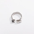 Detail of the irregular lava texture and polished silver finish on the open ring - Adjustable Open / Silver