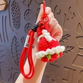 Handmade crochet red bell-shaped floral keychain with bow and bell pendant - Red Rose (Dress Style)