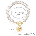 Baroque pearl bracelet with golden heart locket and toggle clasp in 20cm length - S2109-1 Open Heart