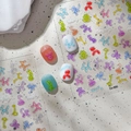 3D embossed nail stickers featuring rainbow translucent balloon animals and happy letters - Co-580