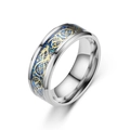 Detail showing the blue carbon fiber inlay and golden Celtic dragon pattern on the ring band - Silver Blue Gold