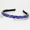 Elegante diadema con cristales rectangulares azul real engastados en metal dorado - Azul