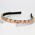 Diadema elegante de cristales champán sobre terciopelo negro con vista lateral clara - Rojo Rosa