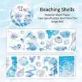 Seaside Scenery washi tape featuring detailed blue shells and ocean wave patterns - Shell Collecting Beach