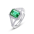 Classic S925 silver halo ring featuring 1.25ct emerald cut green gemstone with split shank - Lab Grown Emerald (Adjustable)