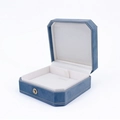 Blue velvet octagonal jewelry box with golden buckle and ivory satin interior - Blue Octagon Jewelry Box (JB016146)