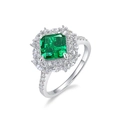 Eleganter Ring mit Smaragdschliff und glitzernden Seitensteinen in Silberoptik - US8# / Smaragdgrün