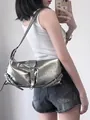 Detail of silver metallic shoulder bag featuring Y2K buckle and adjustable side strap - Silver