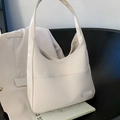 Minimalist large creamy white soft leather bucket tote bag with wide shoulder strap - White