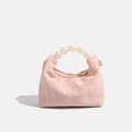 Pink pearl handle dumpling bag with pleated texture and gold hardware detailing - Pink