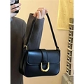 Classic black leather underarm bag featuring a vintage gold horseshoe buckle closure - Black