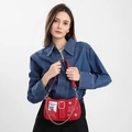 Retro red denim star shoulder bag with metal chain strap for women shown on model - Burgundy