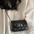 Elegant black quilted leather mini flap bag with gold chain and metal sphere detail - Black