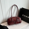 Glossy wine red bow Boston handbag with long shoulder strap and vintage aesthetic - Burgundy