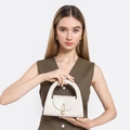 Minimalist semicircular off-white leather handbag with a gold lock and curved handle - Off White