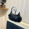 Retro black leather shoulder bag with multi-pocket design and silver hardware - Black