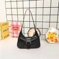 Glossy black crescent shoulder bag with vintage buckle and decorative zippers - Black