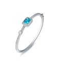 S925 silver bangle with emerald-cut blue gemstone and pavé-set shimmering accents - 925 Silver / Blue